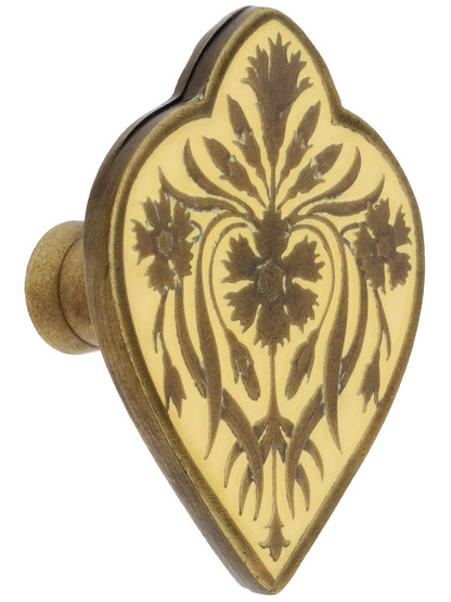 1 1/2 inch W X 1 7/8 inch H Dianthus Knobs in Antique Brass/Saffron.